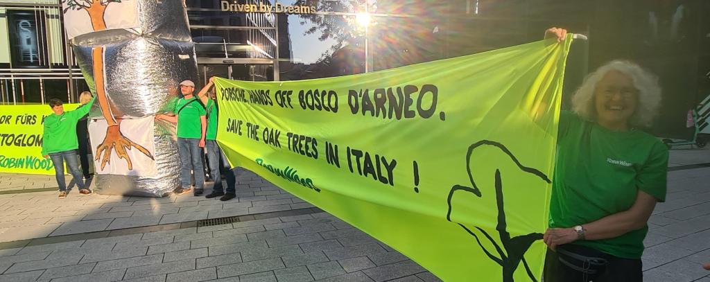 "Porsche, Hands Off the Bosco D'Arneo" - ROBIN WOOD-Protest in front of the Porsche showroom in Stuttgart (Baden-Württemberg, Germany), 06-06-2024